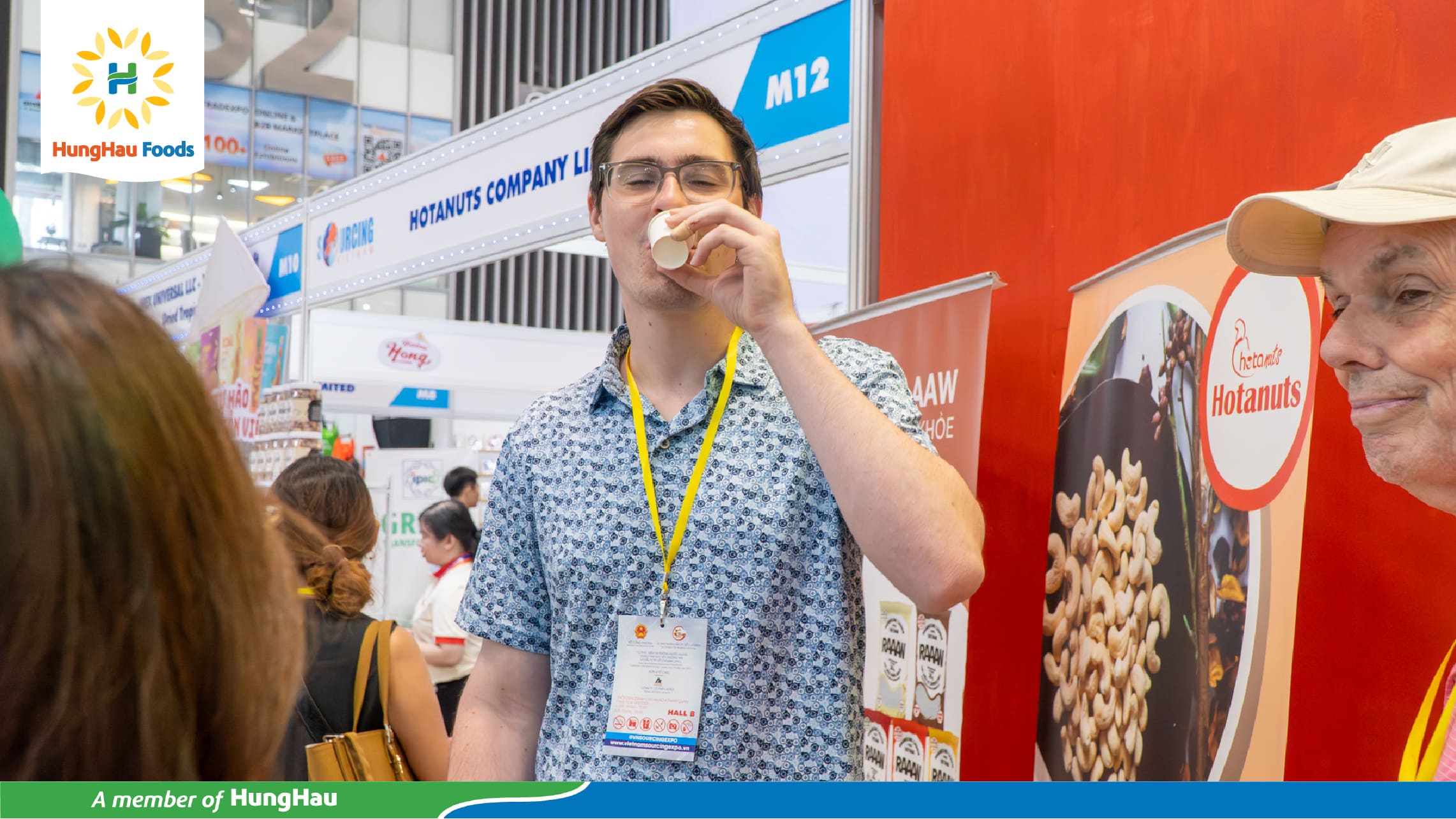 Customer tasting Comoon coconut water at the Sourcing Fair